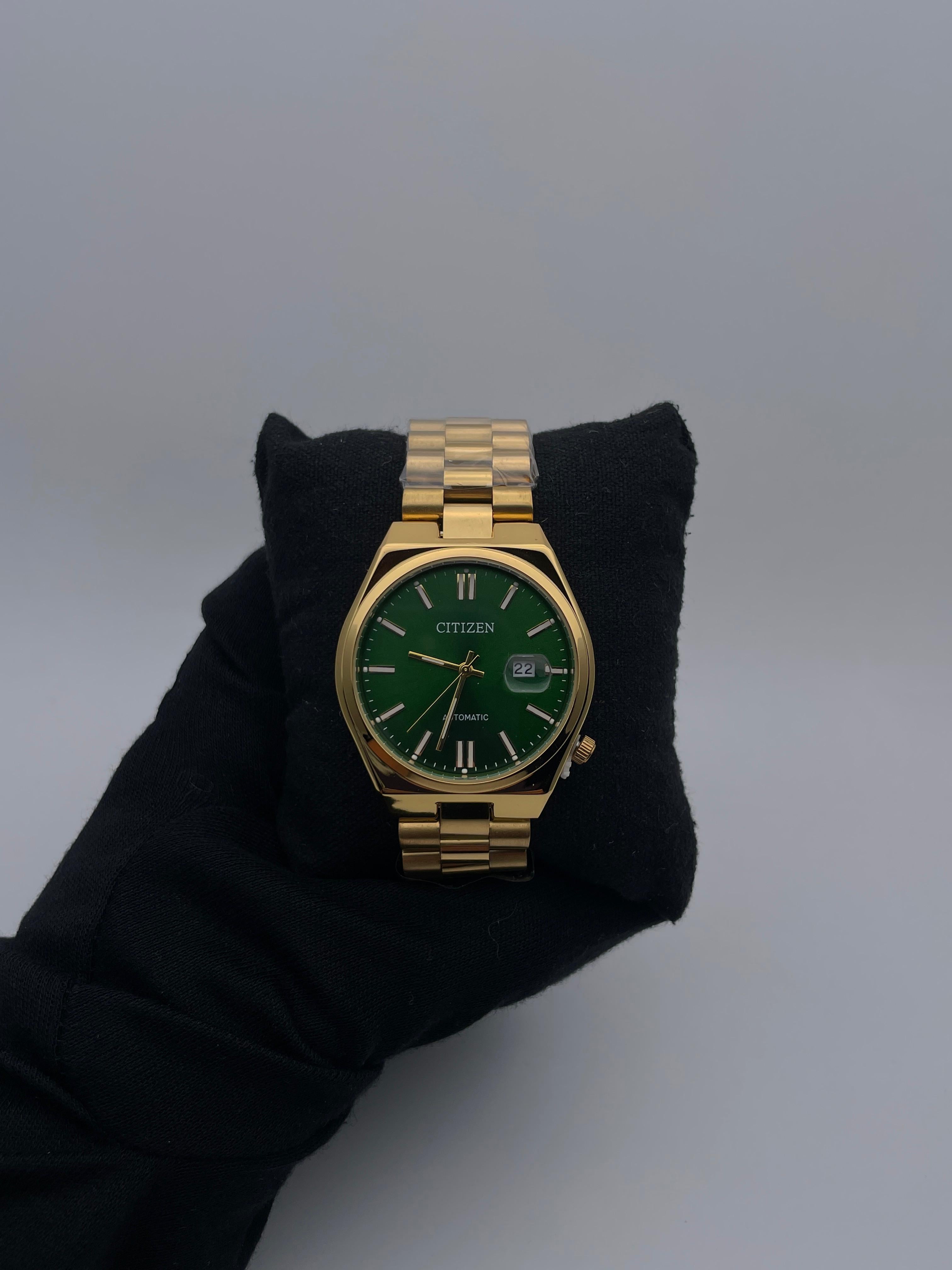 CTZN DTS ACERO/DORADO CARA/VERDE BISEL/DORADO/LISO