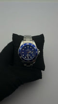 RX SUBMRN ACERO/PLATEADO CARA/AZUL BISEL/AZUL A.
