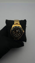 RX SUBMRN TRADICIONAL DORADO CARA NEGRA BISEL NEGRO