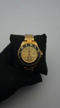 RX SUBMRN TRADICIONAL DORADO BISEL NEGRO CARA DORADA