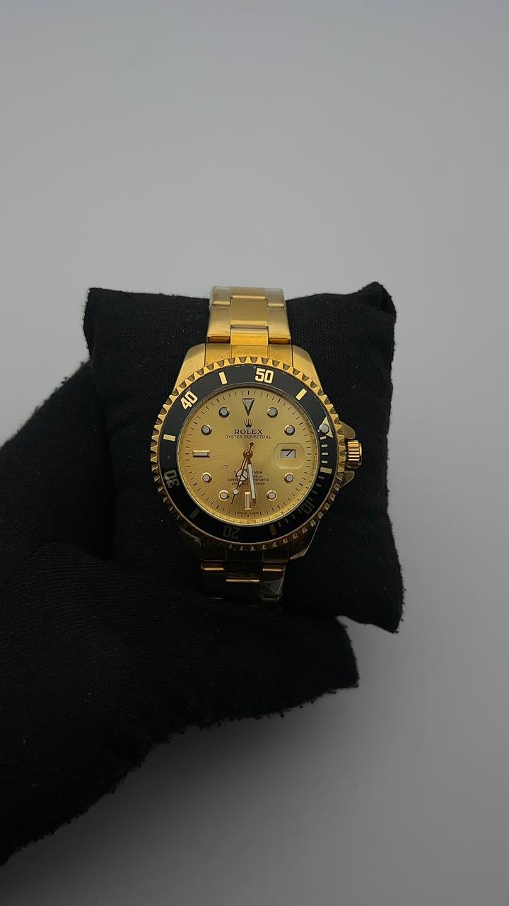 RX SUBMRN TRADICIONAL DORADO BISEL NEGRO CARA DORADA