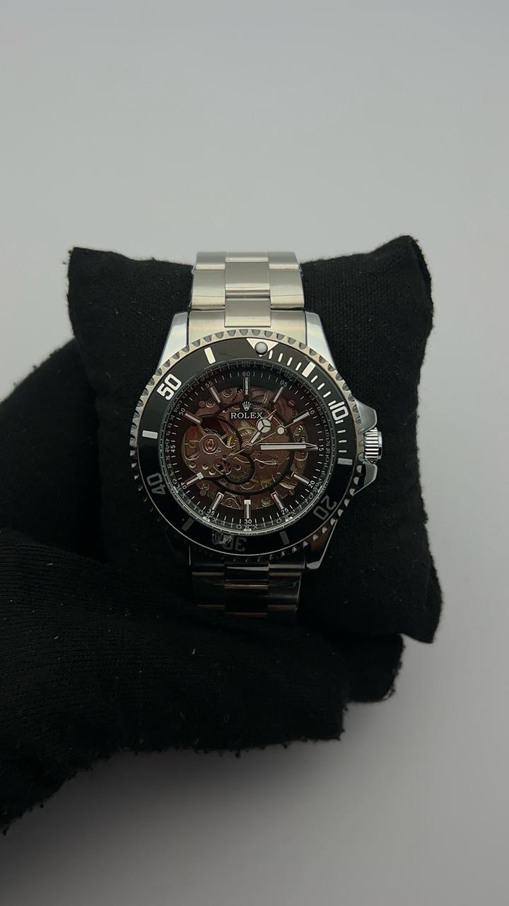 RX AUTOMATICO ACERO PLATEADO CARA NEGRA BISEL NEGRO