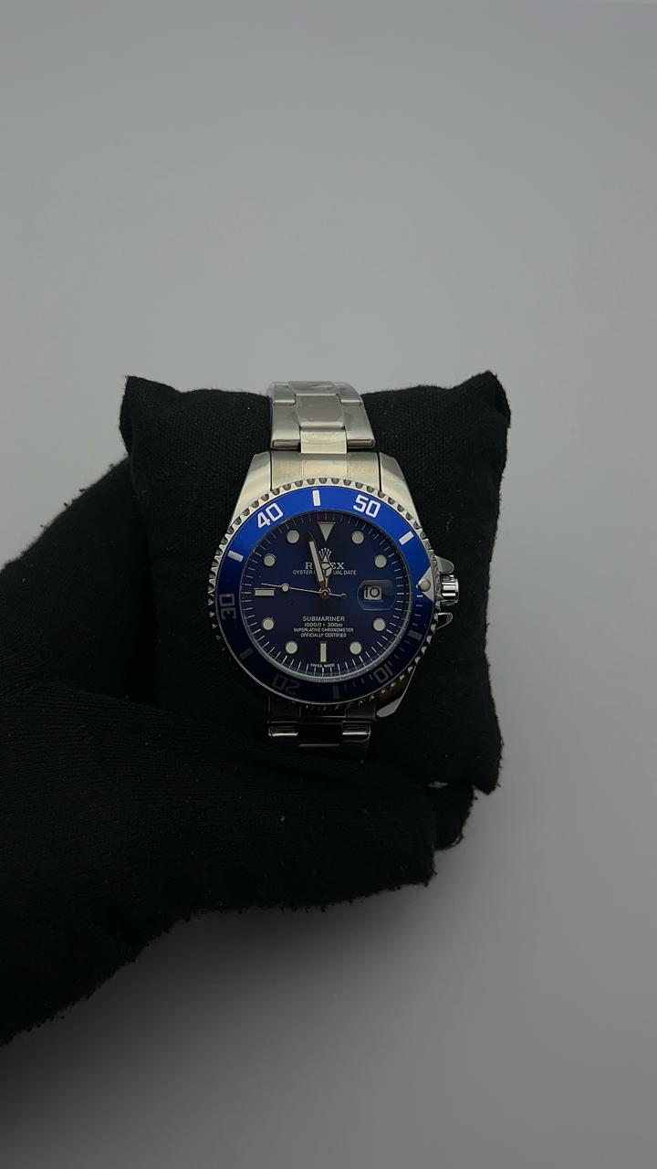 RX SUBMRN ACERO TRADICIONAL PLATEADO CARA AZUL BISEL AZUL C.A.A