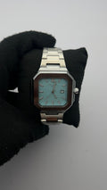 PTK GNV ACERO/PLATEADO CARA AZUL CLARO BISEL PLATEADO