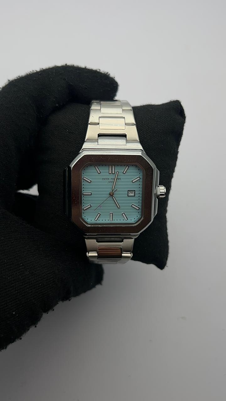 PTK GNV ACERO/PLATEADO CARA AZUL CLARO BISEL PLATEADO