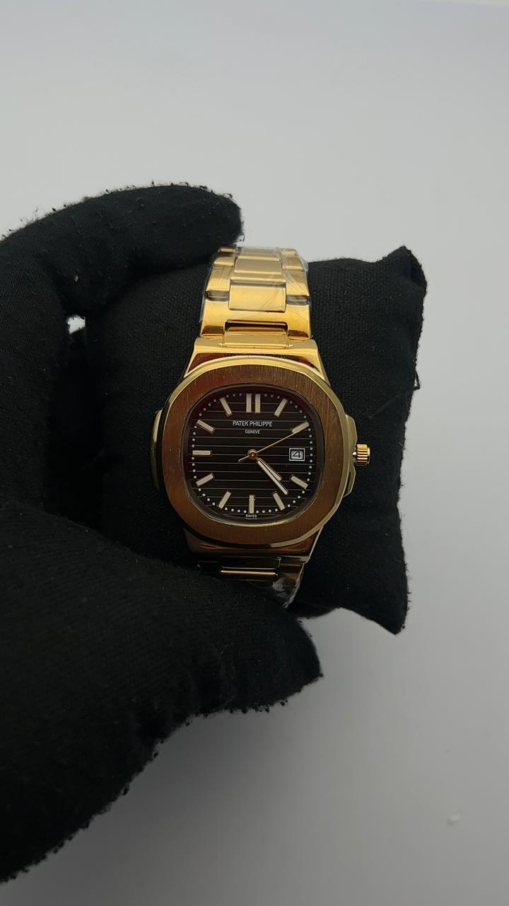 PTK ACERO/DORADO CARA NEGRA BISEL DORADO