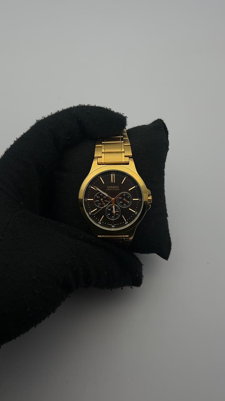 CASIO 3 CRONOS ACERO DORADO CARA NEGRA BISEL DORADO