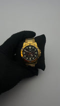 CASIO 3 CRONOS ACERO DORADO CARA NEGRA/BLANCO BISEL DORADO