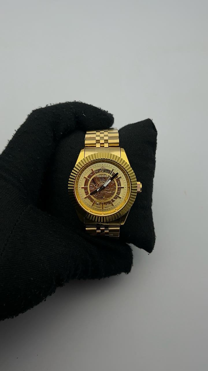 RX AUTOMATICO ACERO/DORADO/TRENZADO CARA/DORADA/SKLTN BISEL/DORADO