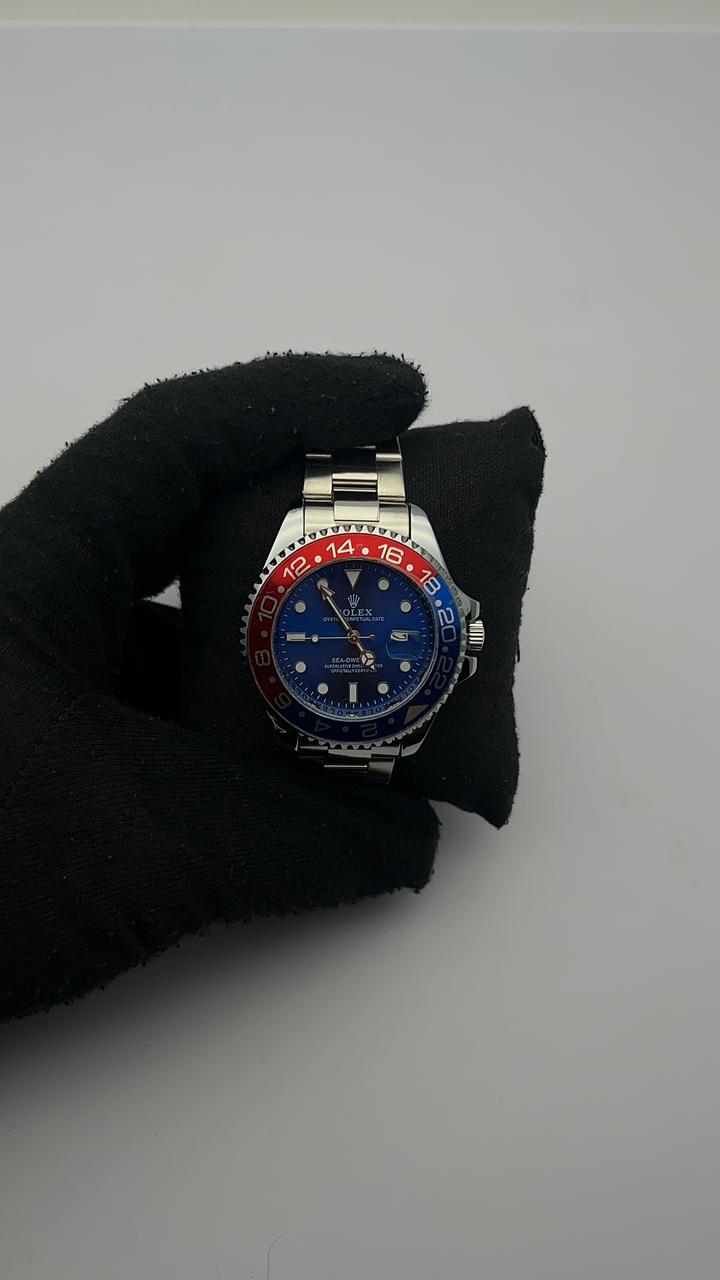 RX SEA ACERO/PLATEADO CARA/AZUL BISEL ROJO/AZUL
