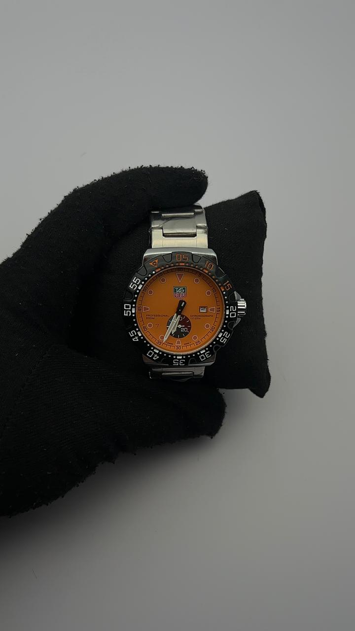 T4G ACERO/PLATEADO BISEL/NEGRO CARA/NARANJA