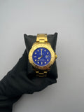 RX YMT ACERO/DORADO CARA/AZUL BISEL/DORADO