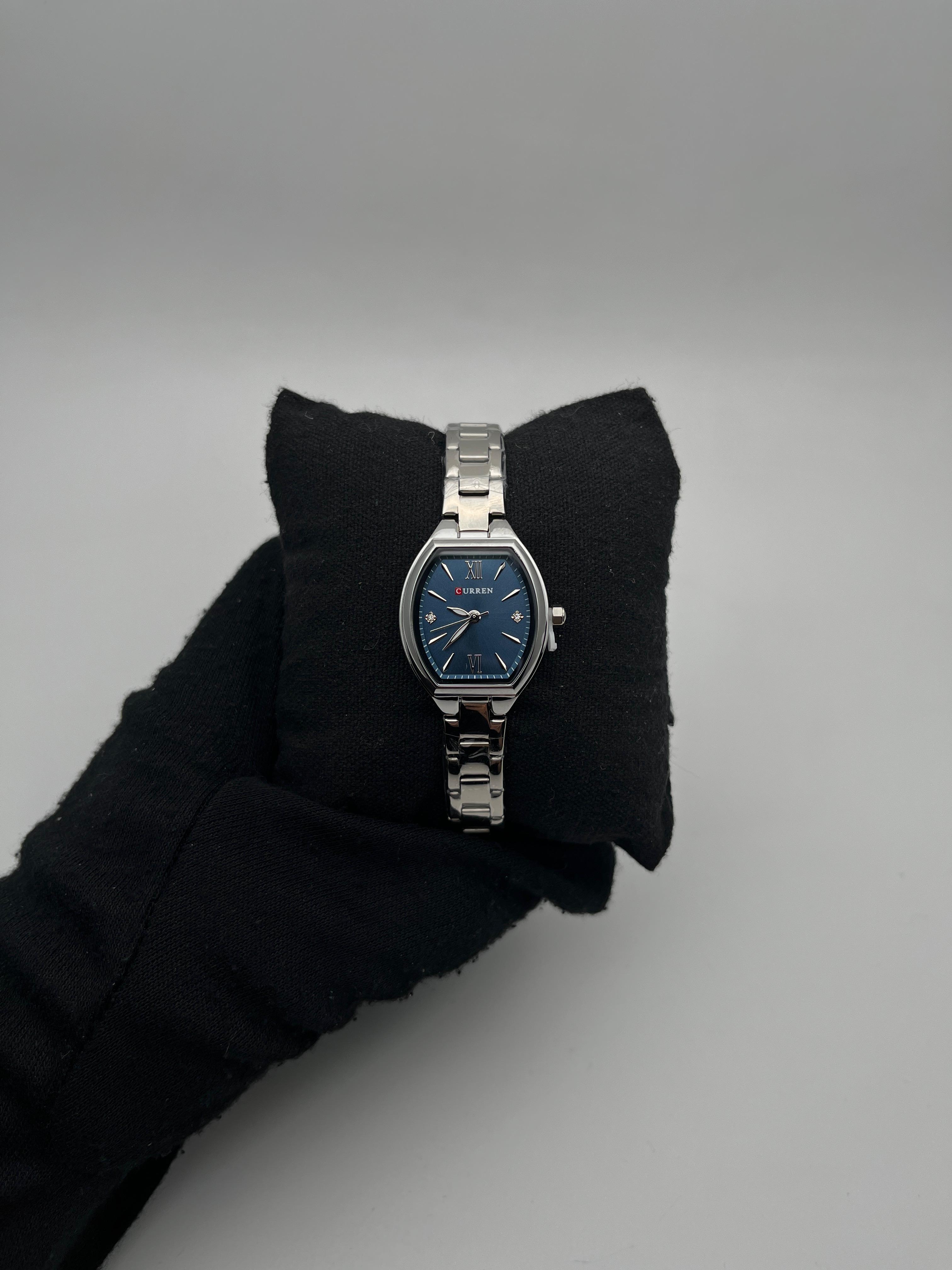 CRRN DAMA 9112 ACERO/PLATEADO CARA/AZUL OSCURA BISEL/PLATEADO