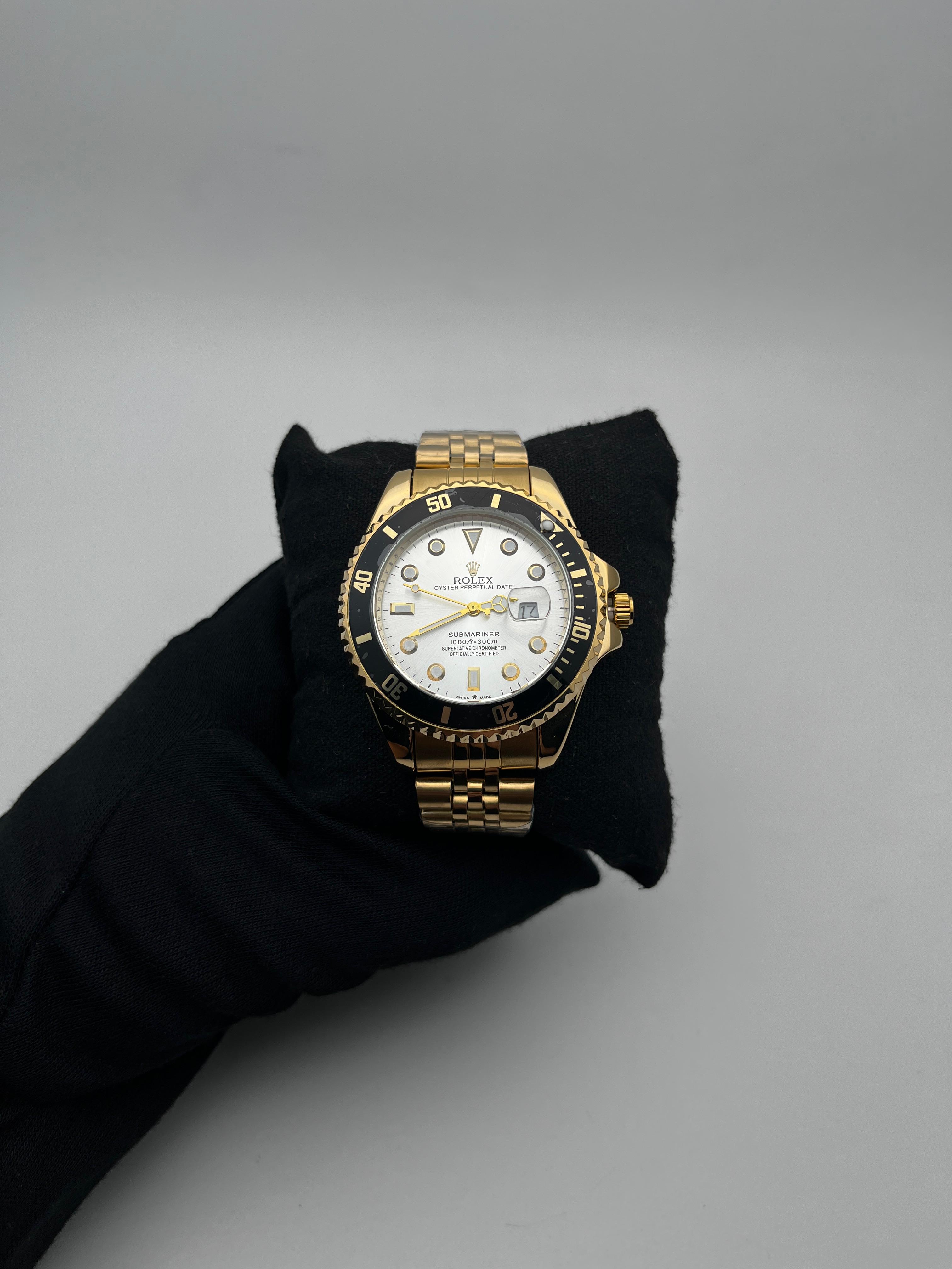 RX SUBMRN ACERO/DORADO/TRENZADO CARA/PLATEADA BISEL/NEGRO