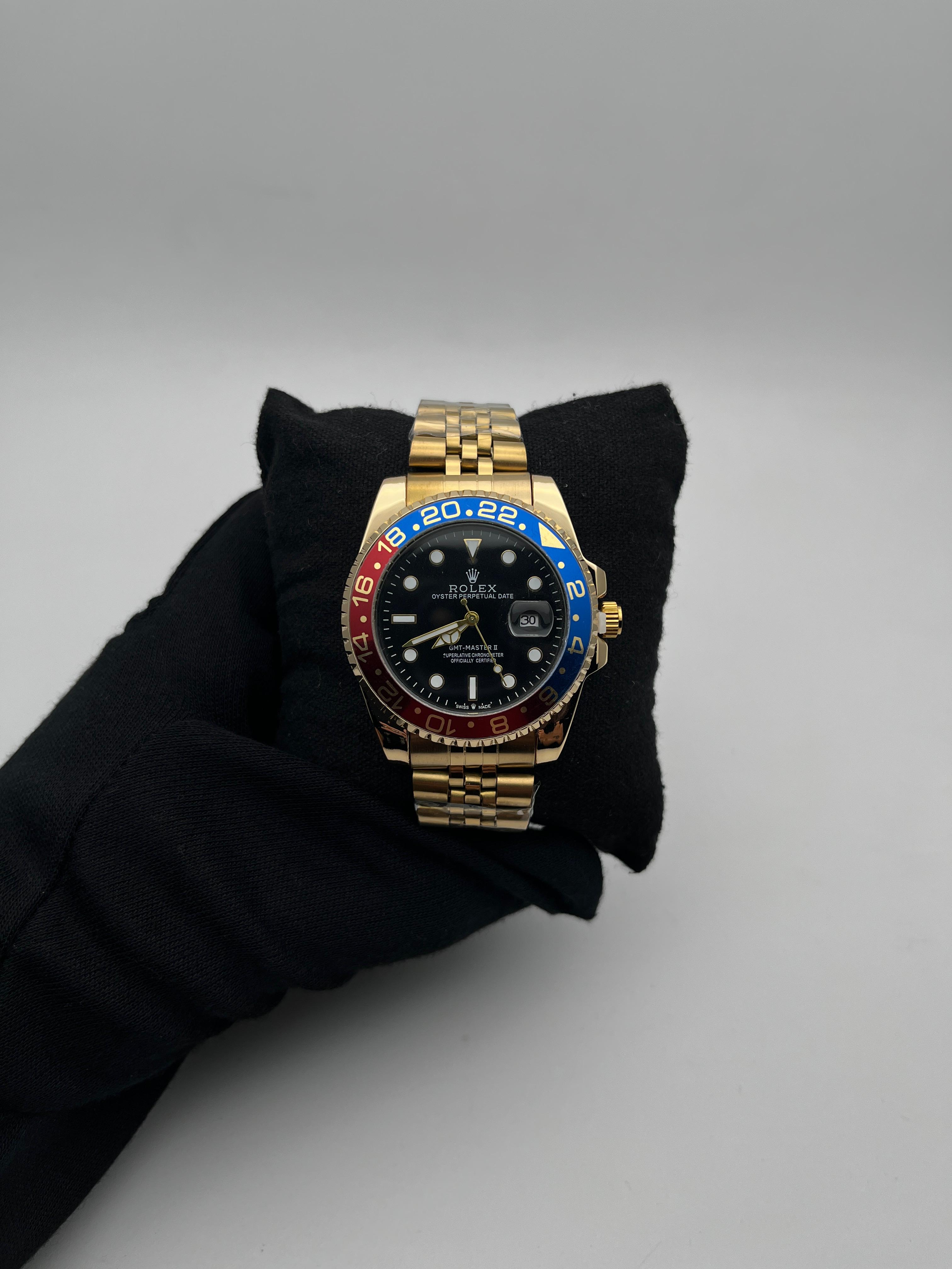 RX GMT ACERO/DORADO/TRENZADO CARA/NEGRA  BISEL/ROJO/AZUL