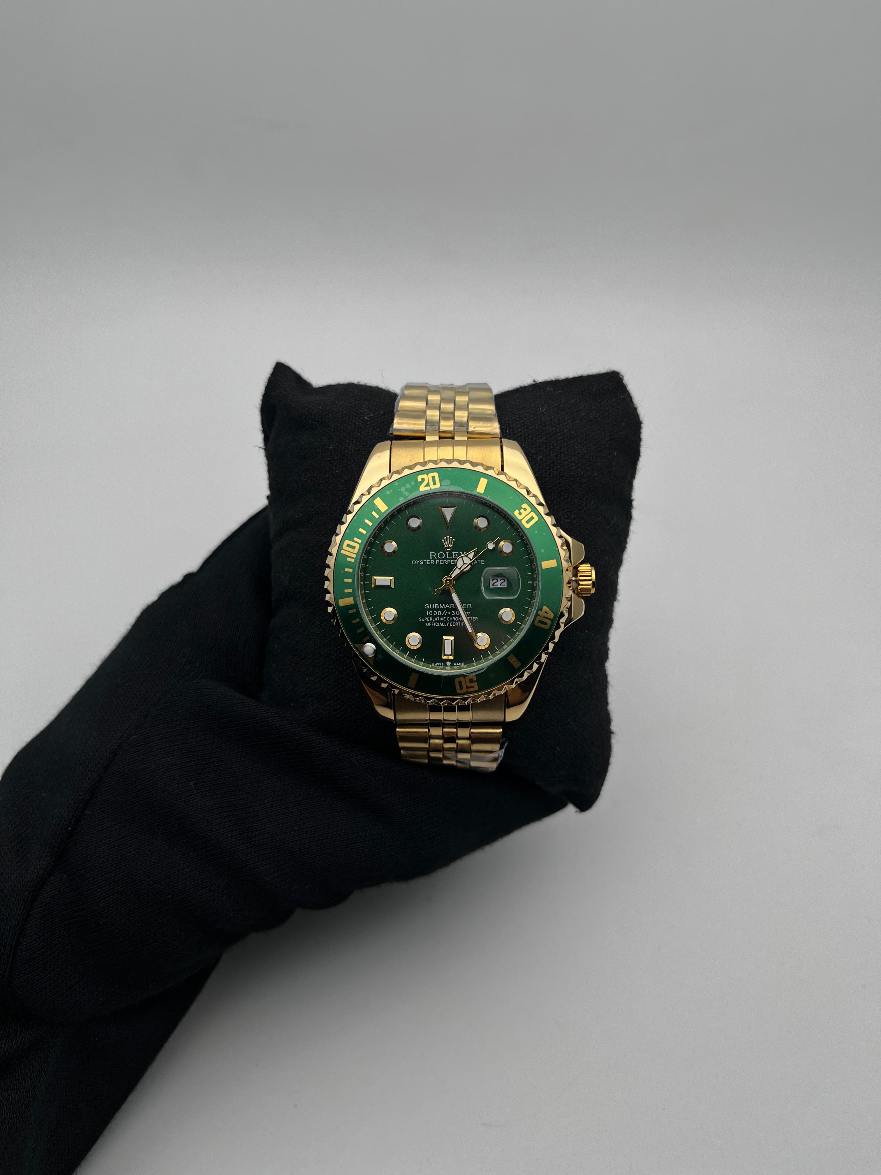 RX SUBMRN ACERO/DORADO/TRENZADO CARA/VERDE BISEL/VERDE