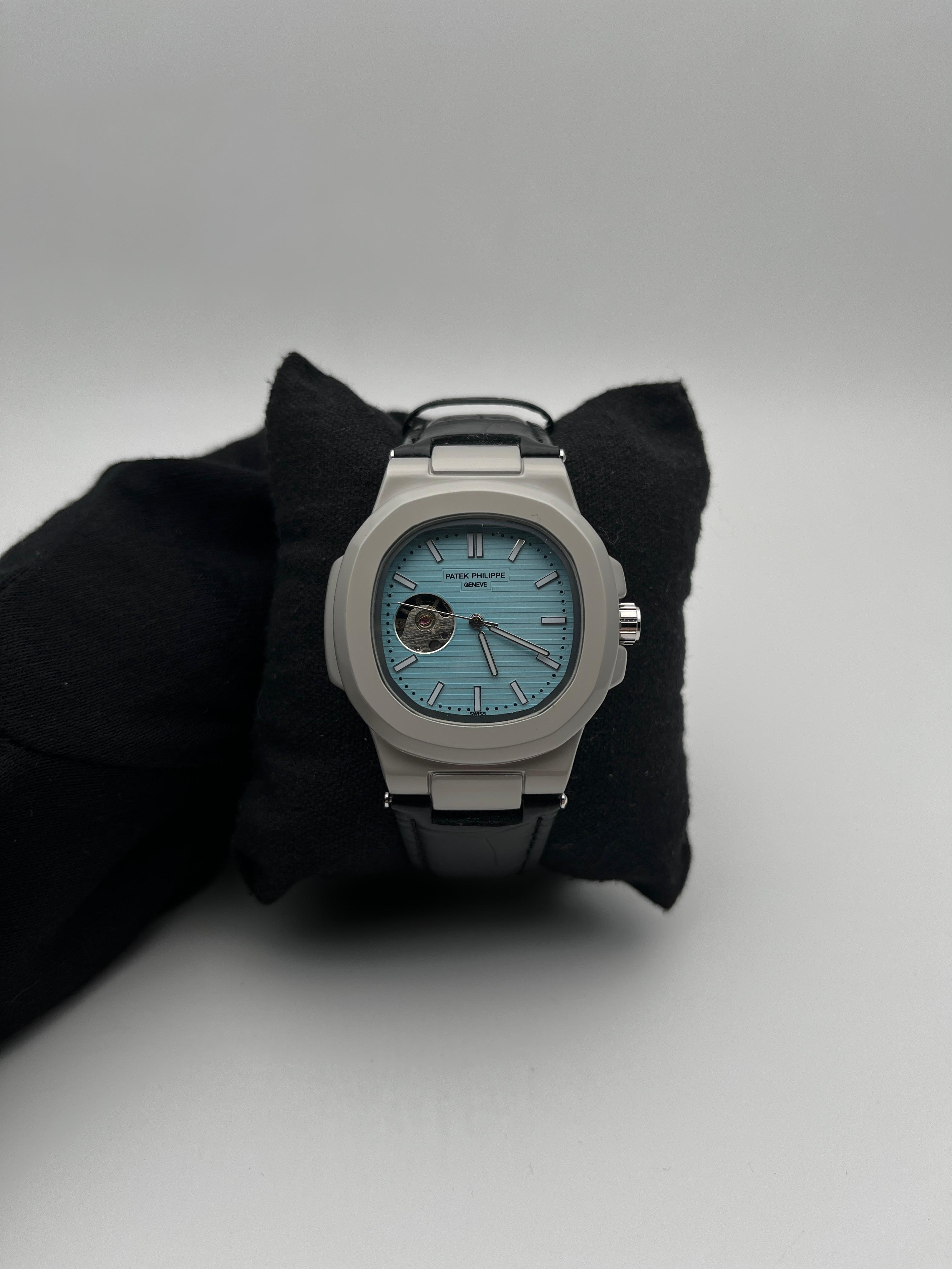 PTK AUTOMATICO CUERO/NEGRO CARA/AZUL CLARA BISEL/PLATEADO