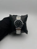 Q&Q 005PY DAMA ACERO/PLATEADO CARA/NEGRA BISEL/PLATEADO/LISO