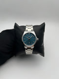 CRRN DAMA 8439 ACERO/PLATEADO CARA/AZUL BISEL/PLATEADO/LISO